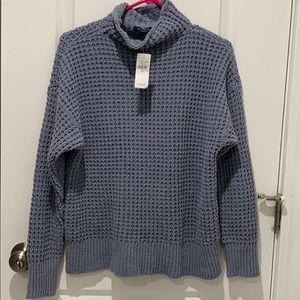 New blue turtleneck sweater